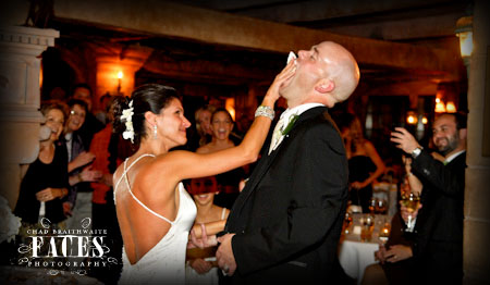 Bride feeds groom cake