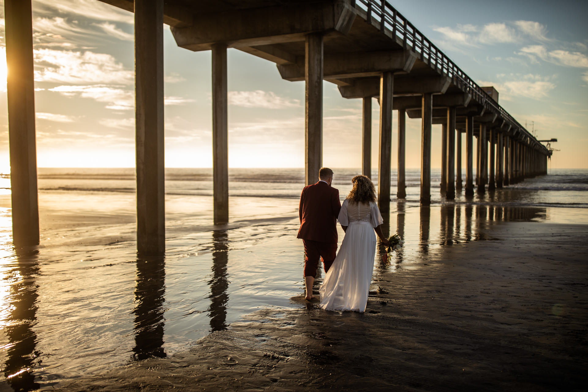 Gerusa Eric Scripps Pier Beach Wedding by Faces Photography