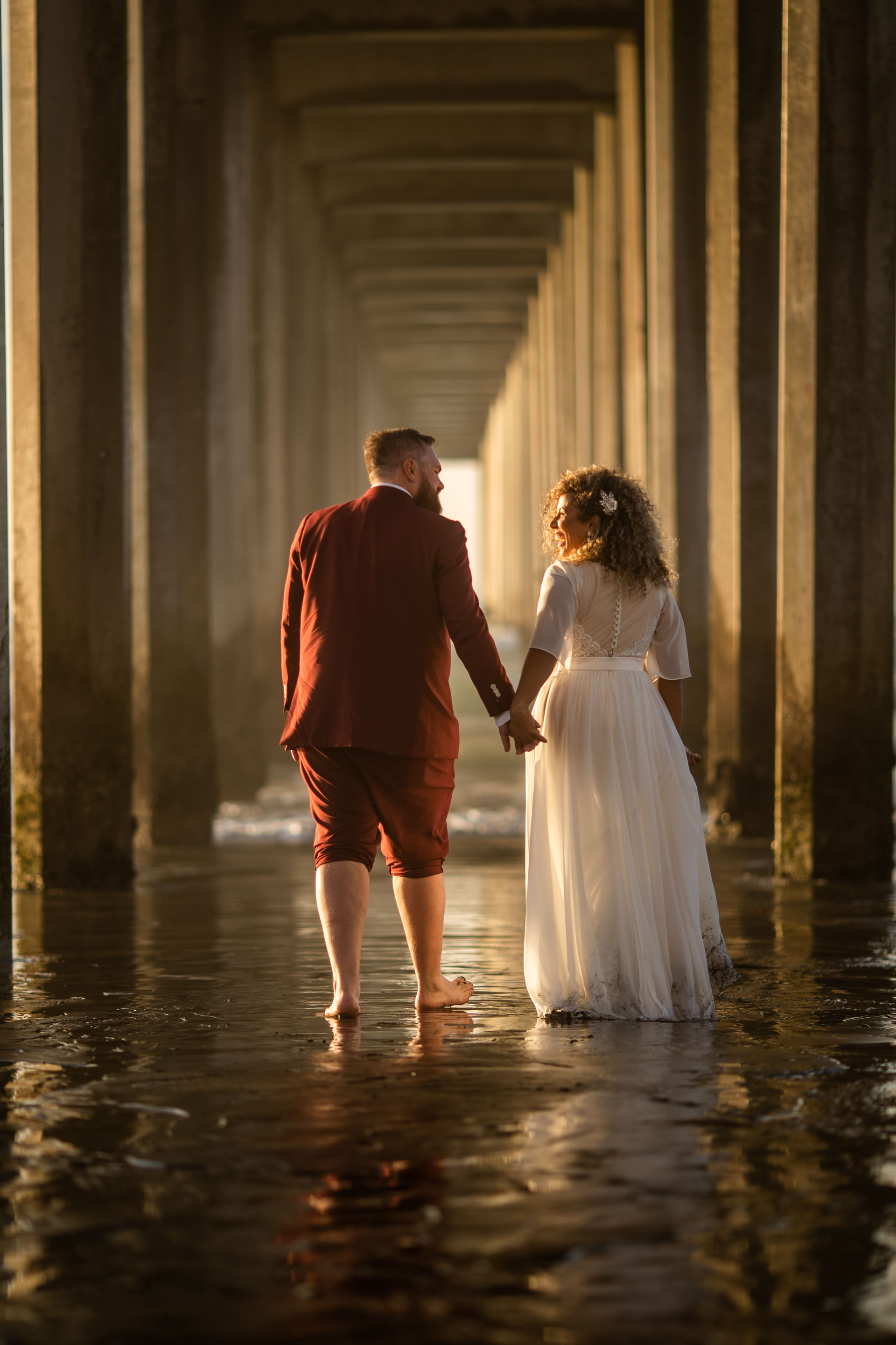 Gerusa Eric Under Scripps Pier Beach Wedding Faces Photography