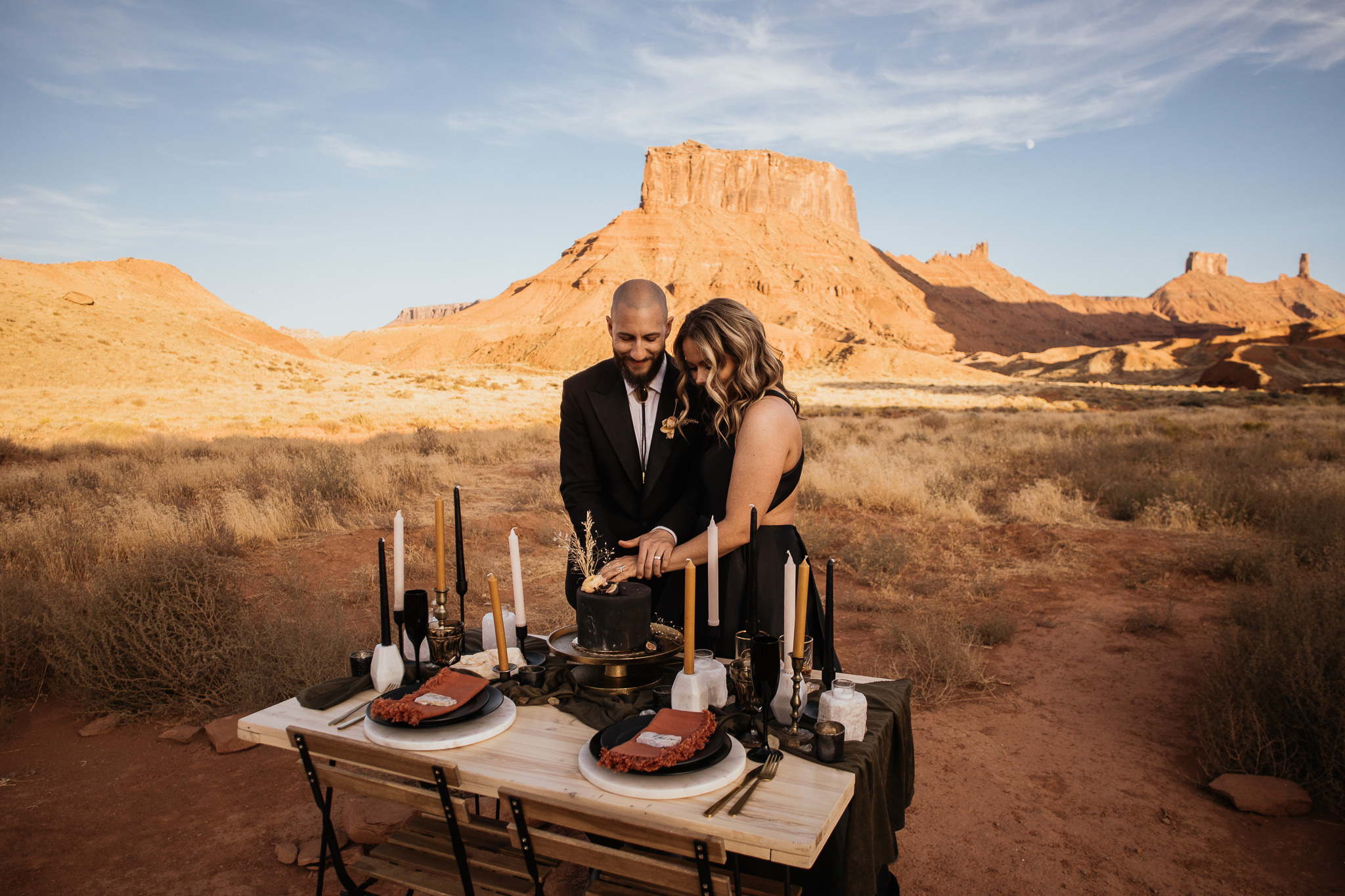 Bride and Groom Cut the Cake in Moab Utah