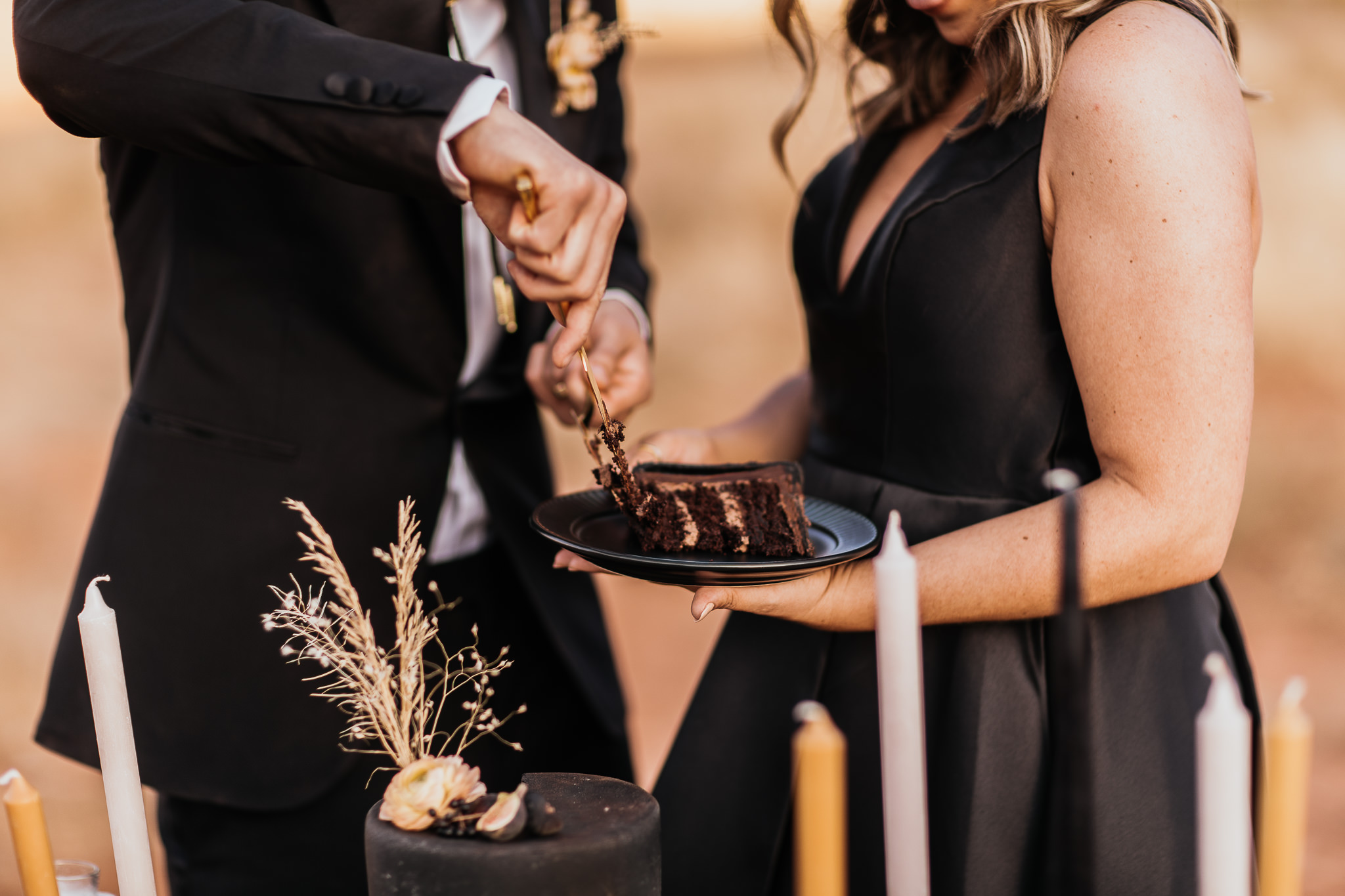 Bride and Groom Cut the Cake in Moab Utah