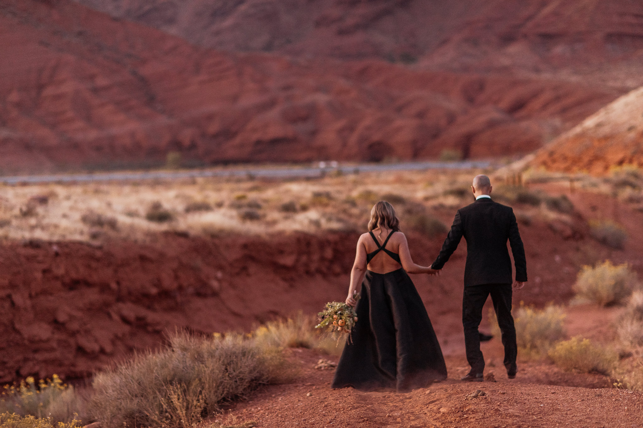 Bride and Groom Take Formal Portraits in Moab Utah