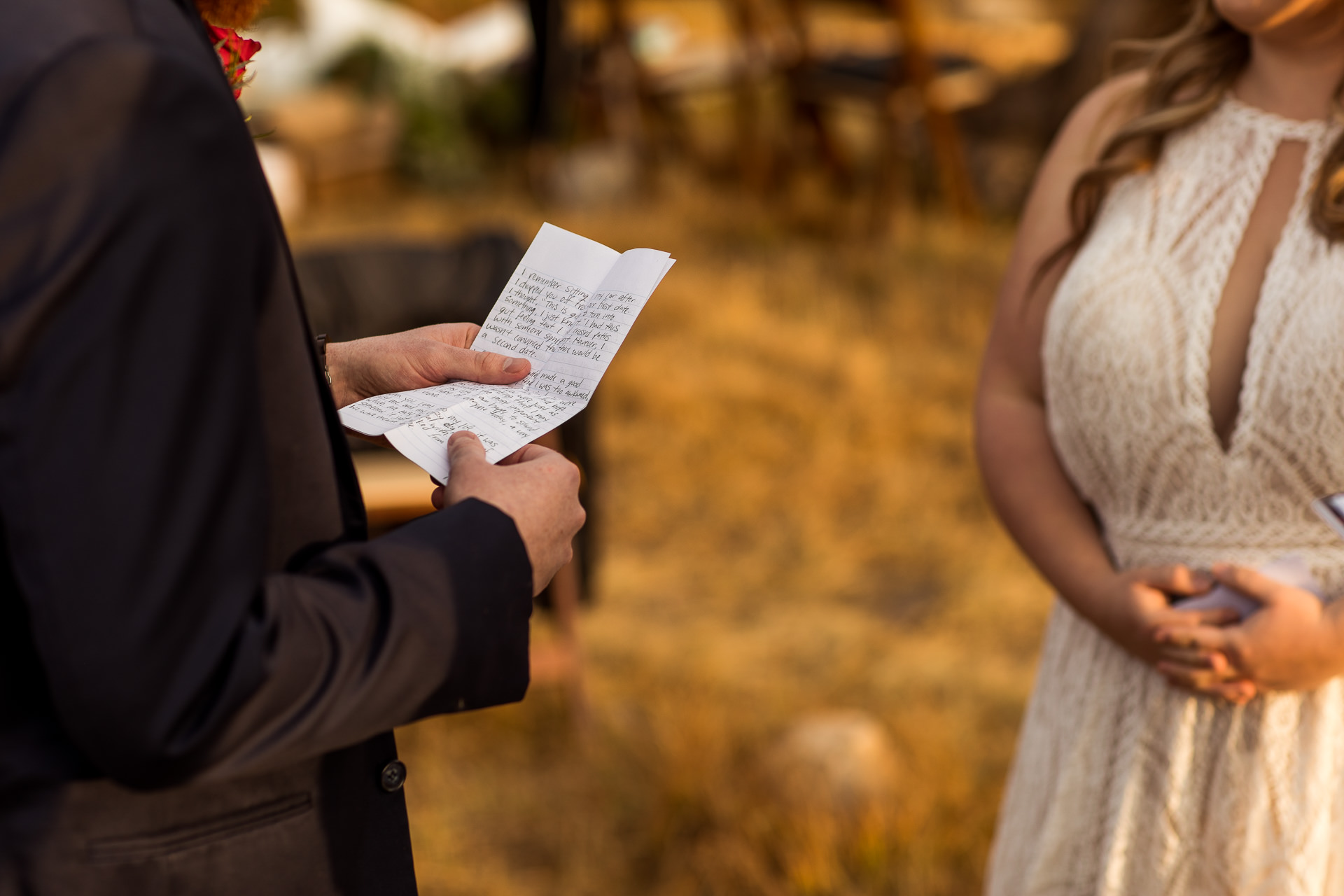 Groom Reads Vows to Bride