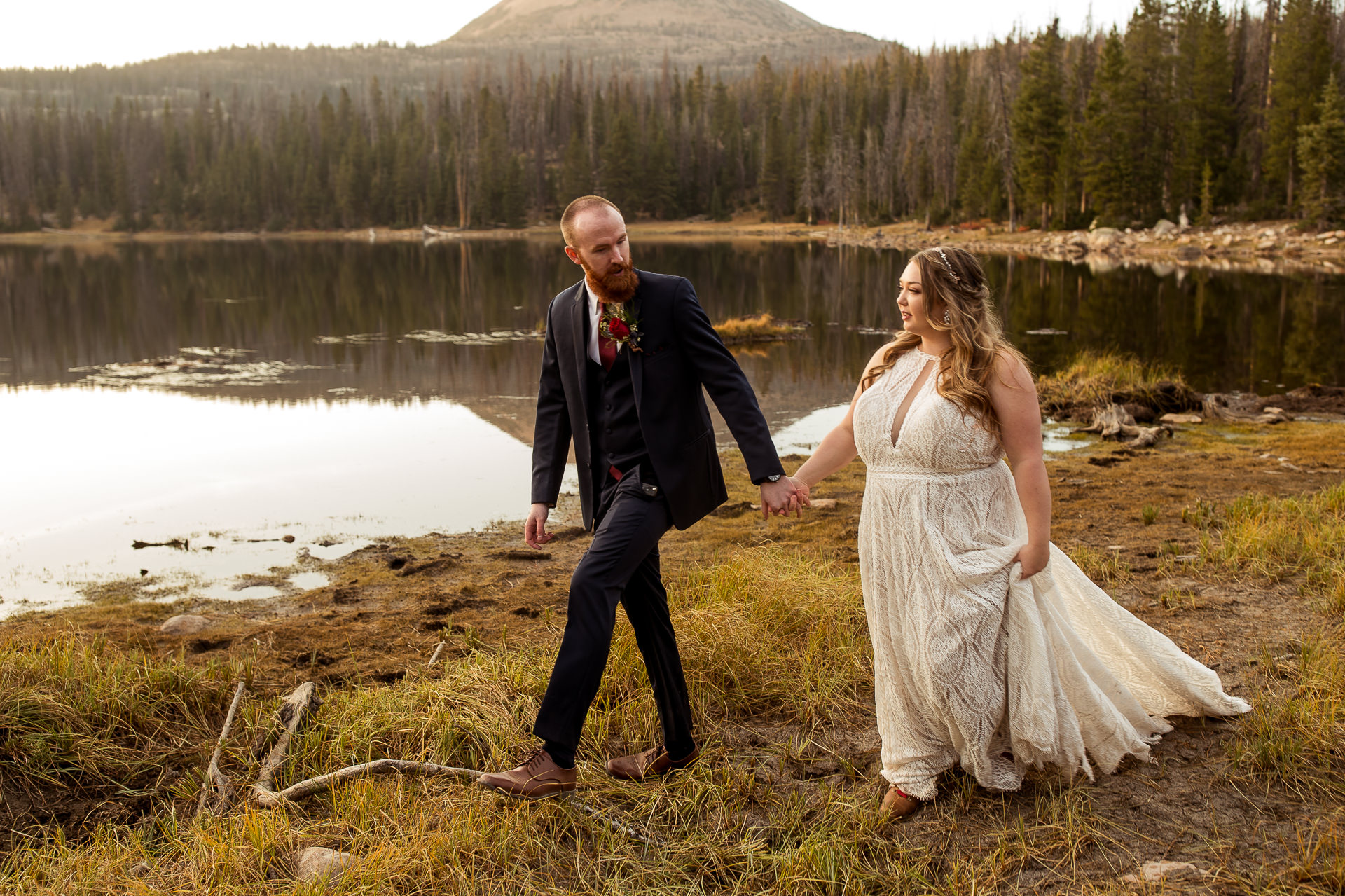 Wedding Couple Walks Lakeside