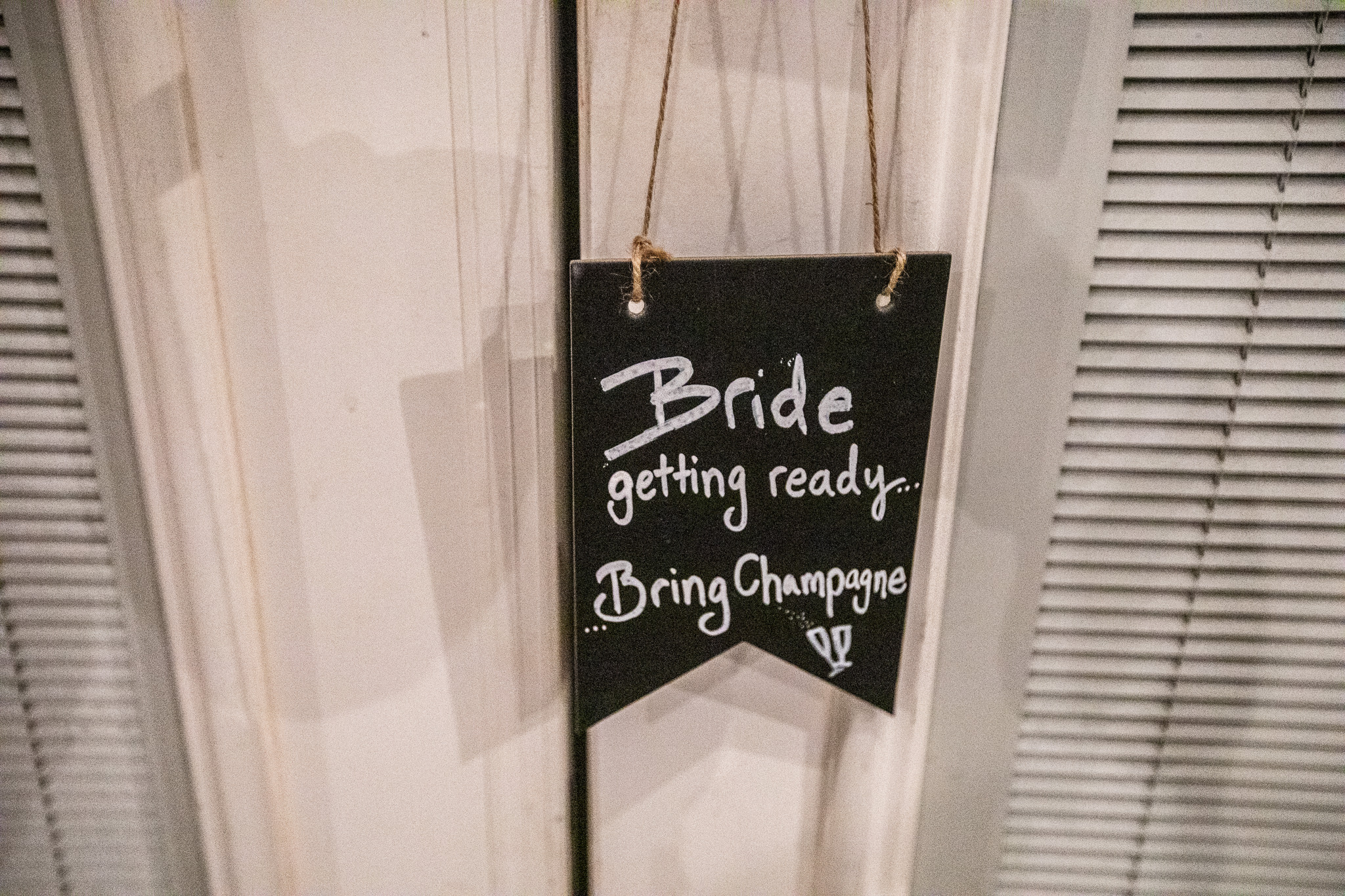 Sign on Bride and Groom Door