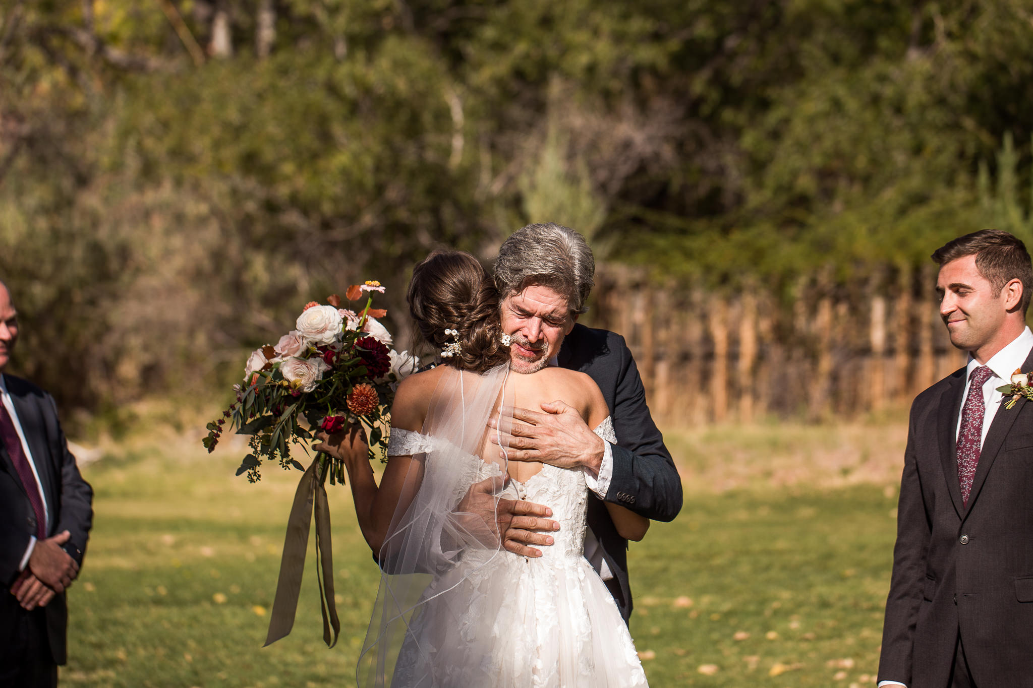 Dad Hugs Bride