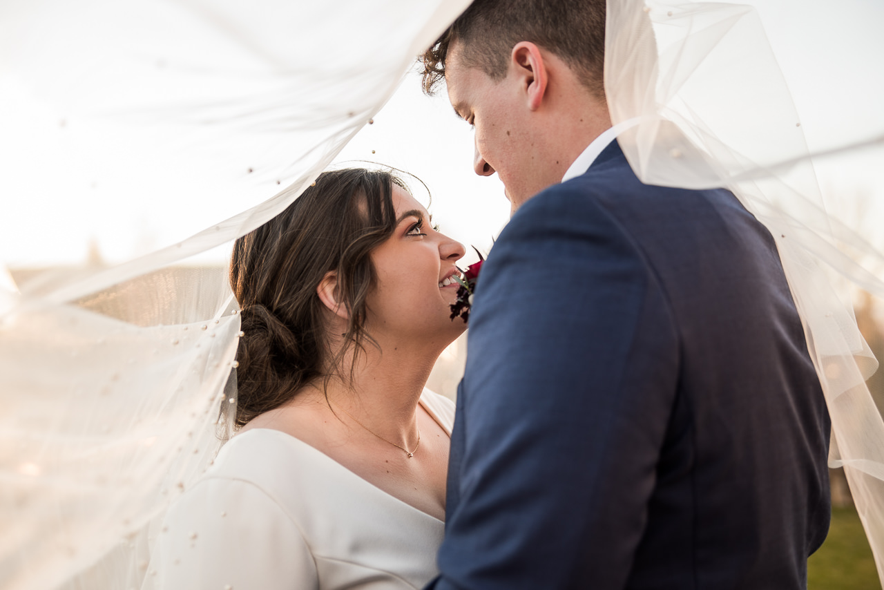 Bride and Groom Couple Portraits under veil