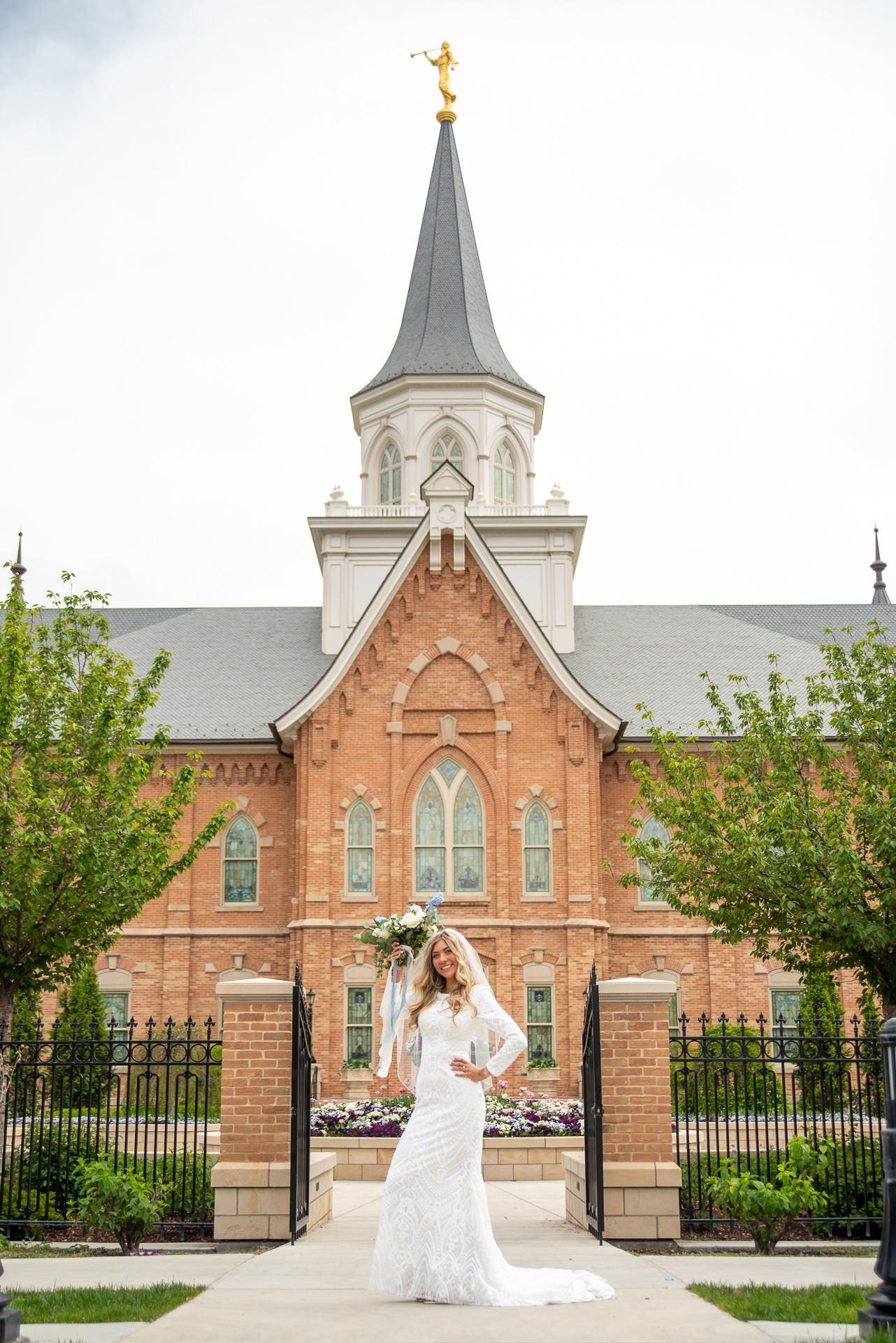 Bride and Groom Greet Guests Outside Temple