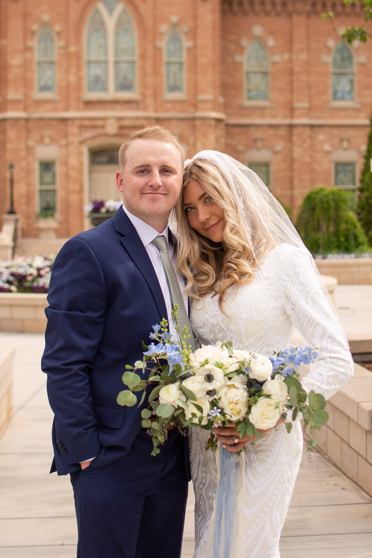 Bride and Groom Greet Guests Outside Temple